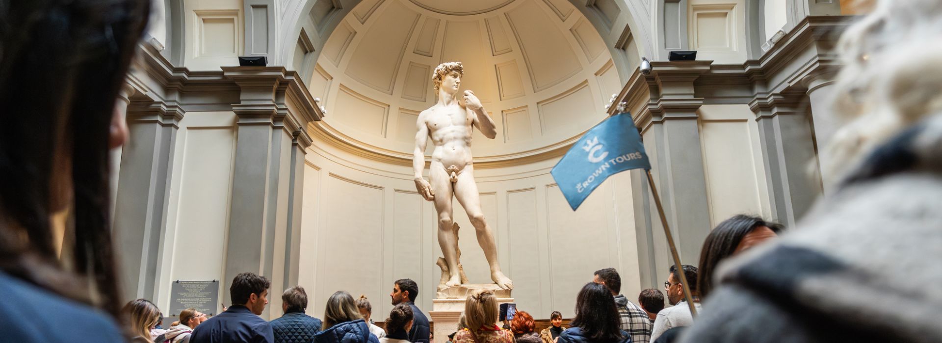 Front of Michelangelo's statue of David at the Accademia Gallery in Florence, Italy