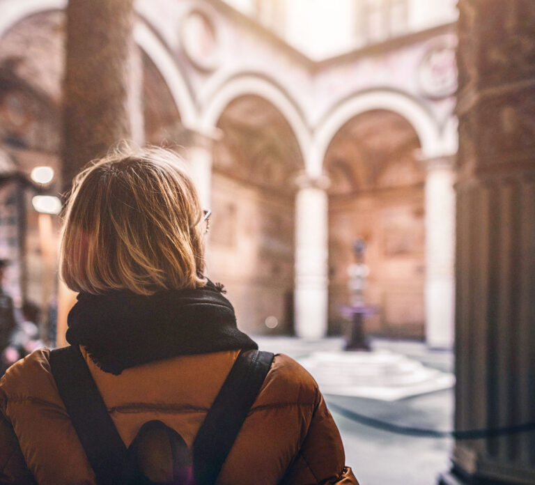 Visitor taking in the Accademia Gallery