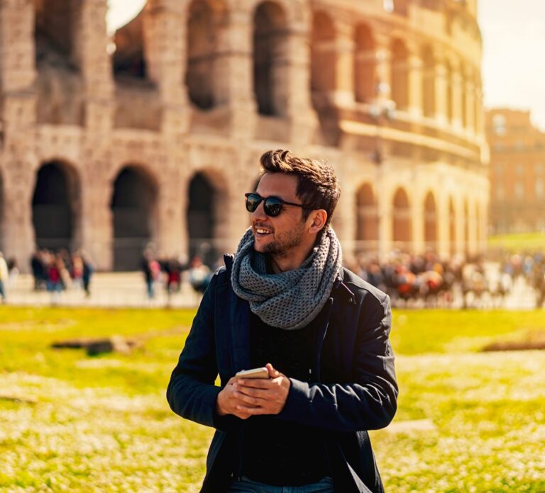 tourist-guy-in-park-outside-colosseum