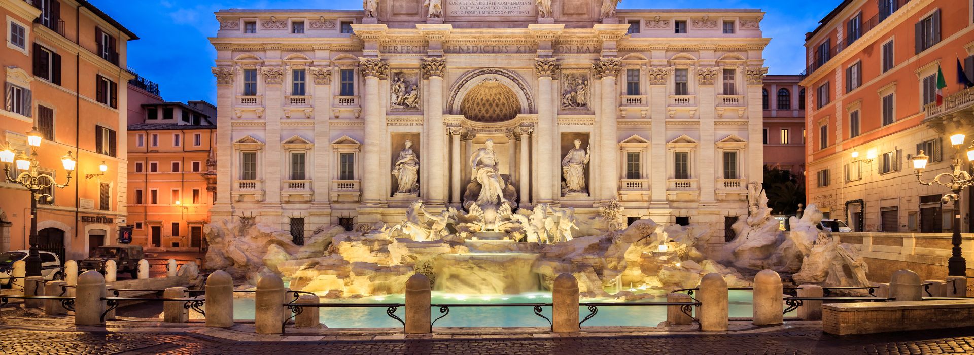 Enjoy a quiet view of the Trevi Fountain at night cultural features