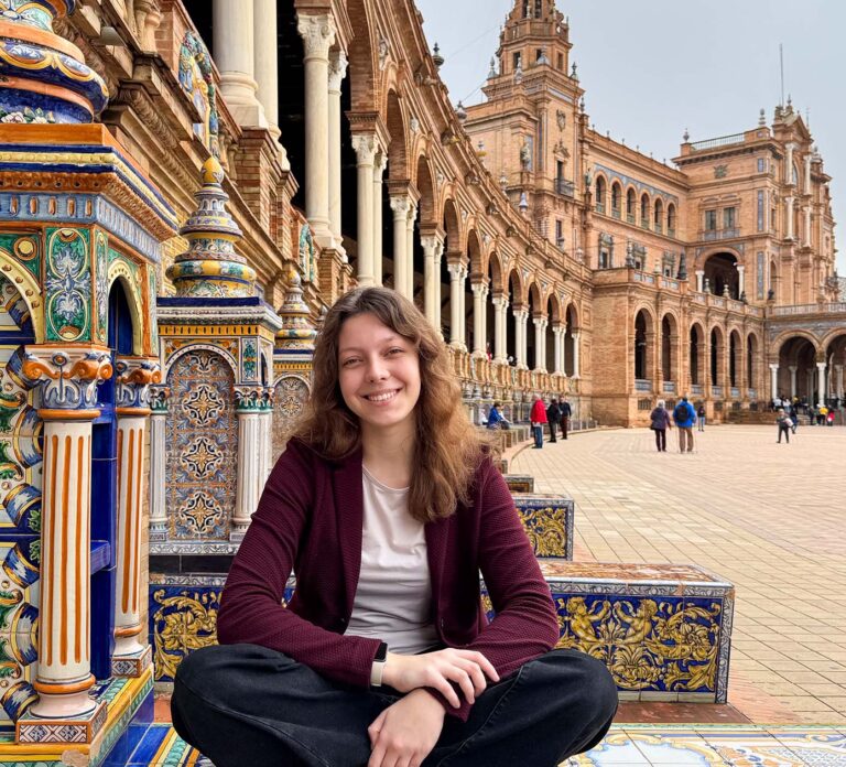 tourist infront of the cathedral in seville, spain